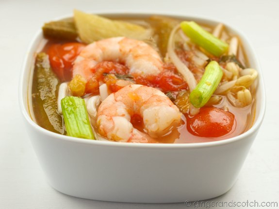 Vietnamese Sweet and Sour soup that can be ready in under 30 minutes. Pineapple is used to sweeten the broth and lemons are used for the sour element. Easy and fast to prepare. Vietnamese Sweet and Sour Soup