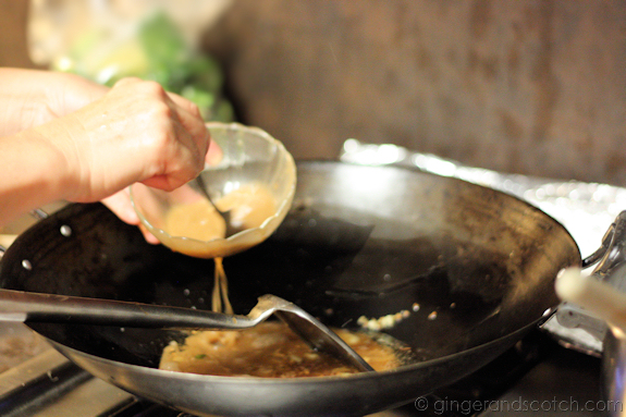 Clams in Asian Basil Sauce - Adding the oyster sauce mix into the garlic-ginger hot oil
