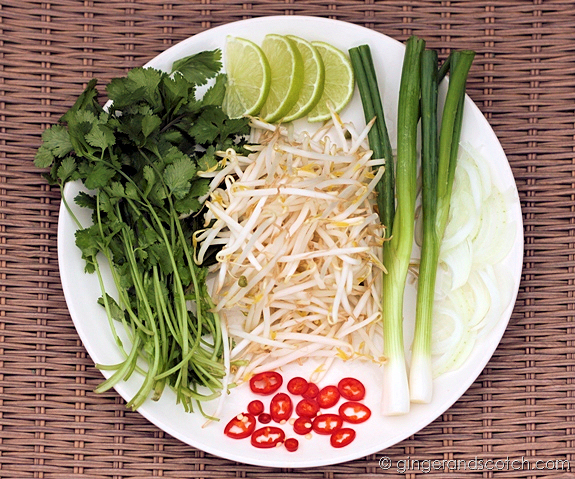 Fresh herbs, chillis, and limes Fresh herbs, chillis, and limes