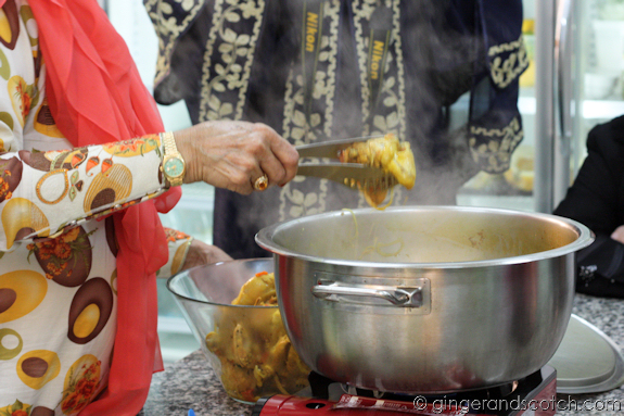 Removing the chicken pieces before adding the rice