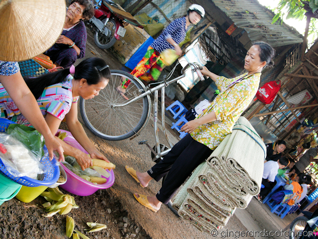 Mekong Lady Buying Steamed Corn on the Cob