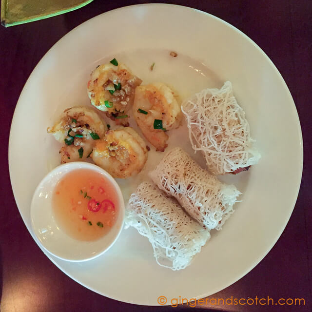 Deep-fried spring rolls with crab, shrimp and shitake mushrooms; served with rice noodles and fresh herbs
